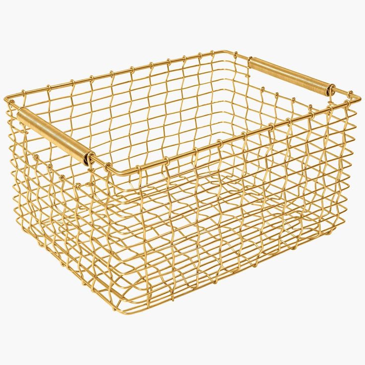 a gold wire basket with handles on the bottom and sides, in front of a white background