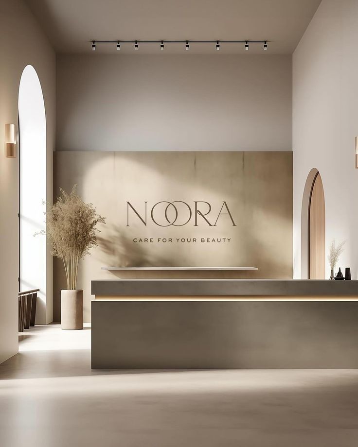 the front desk of noora is shown in this modern, minimalist style lobby