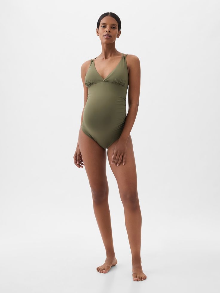 Soft, stretch maternity one-piece swimsuit.  V-neck.  Tank straps at front, strappy details at back.  Certain styles have allover prints.  This one-piece is made with 83% recycled polyester.  Less waste in the world.  More great swimsuits for you.  Please note: Maternity styles cannot be returned in store.  Please enjoy free returns by mail.  Choose your maternity Gap Swimwear For Beach Season, Gap Summer Swimwear For Beach Season, Gap Summer Swimwear, Summer Pool Swimwear By Gap, Summer Swimwear By Gap, Gap Summer Swimwear For Pool, Gap Summer Swimwear For The Pool, Gap Swimwear For Beach Season Vacation, Gap Stretch Swimwear For Beach