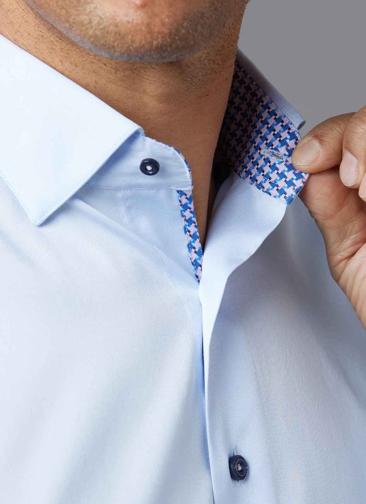 The Caleb shirt makes achieving effortless style a breeze. Its design showcases a refined blue and pink trim, making it the perfect choice for busy men. A part of the "Traveller" collection, it boasts non-iron fabric for added convenience, ensuring you remain polished and well-dressed at all times. Tailored fit Hidden button-down collar Trim detail on front placket, sleeve placket, and inside full collar & cuff Signature Hammer Made logo on gusset 100% cotton Machine wash cold / hang dry Formal Shirt Dress, Sleeve Placket, Knit Outerwear, Polo Sweatshirt, Men Formal, Pink Trim, Custom Suit, Men Shirt, Slim Fit Shorts