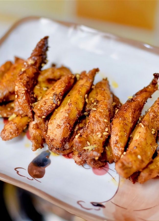 some fried food is on a white plate