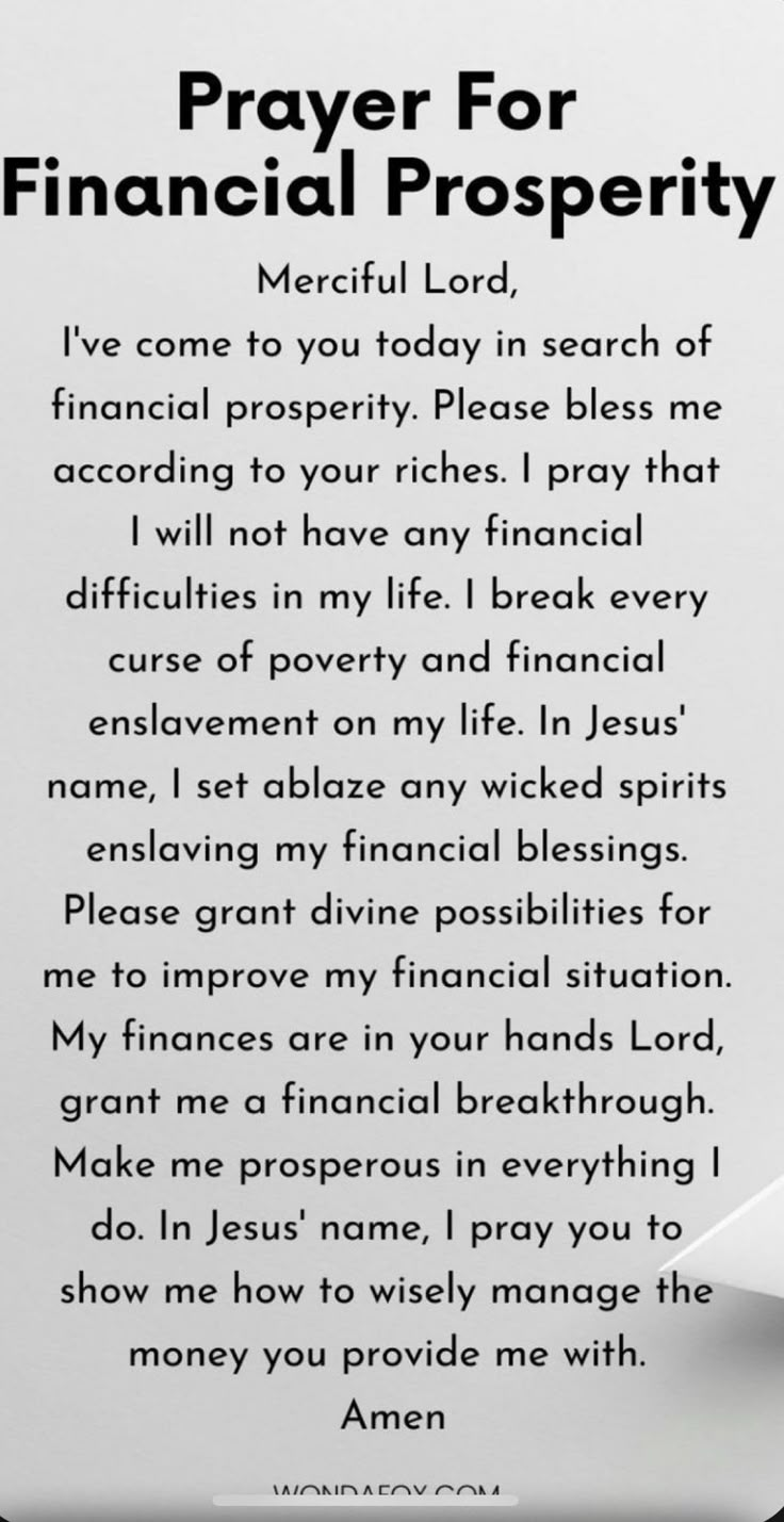 a prayer for financial prosperity written on a white paper with black writing in the center