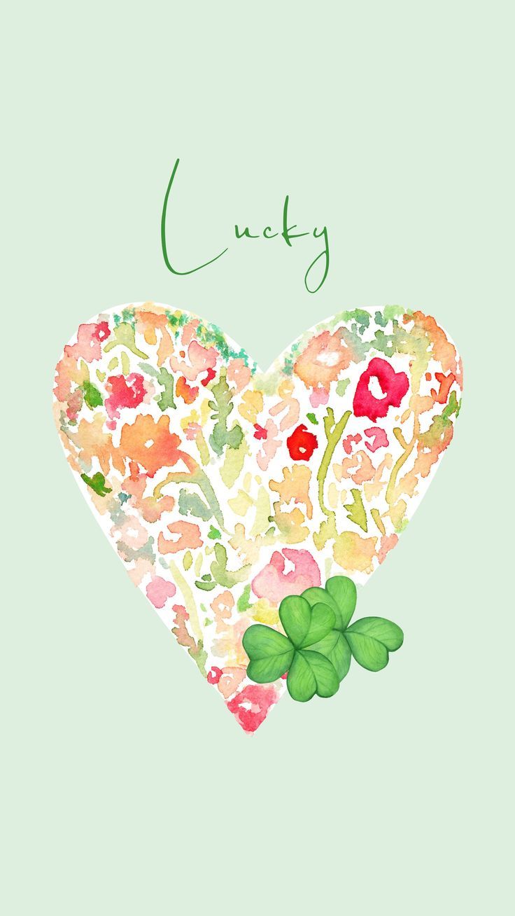 a heart with flowers and clovers on it, the words lucky written in green