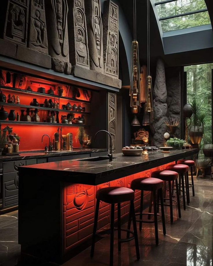 a kitchen with an island and lots of stools next to the counter top that has red lights on it