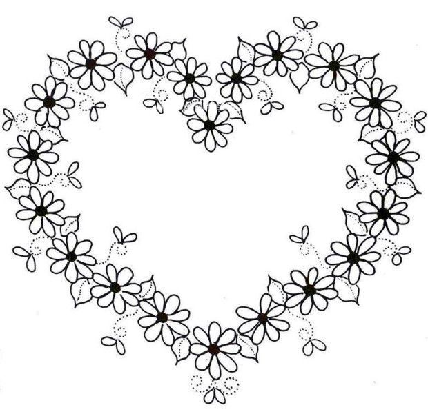 a heart made out of flowers with black and white outlines on the bottom half