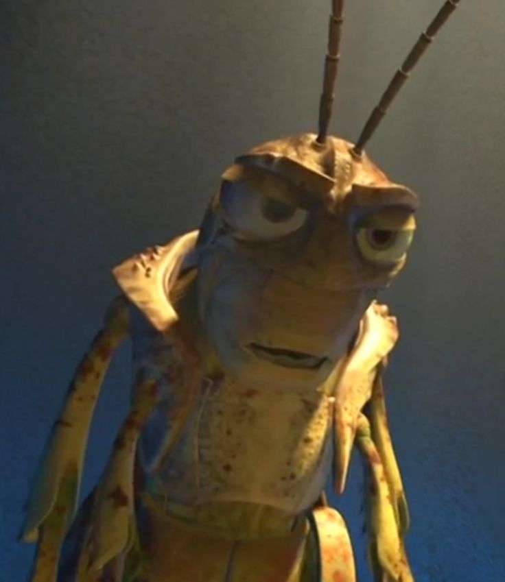 a strange looking creature with large eyes and long legs, standing in front of a blue wall