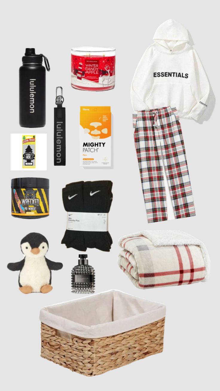 the contents of a travel bag are arranged on a gray background, including clothing and items