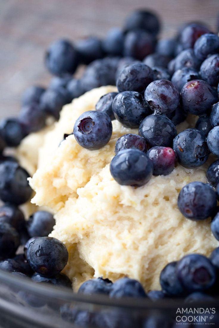 blueberries and mashed potatoes in a glass bowl