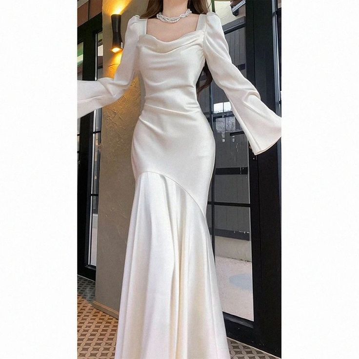 Olivia Mark - Elegant White Wedding Dress with Long Sleeves and Train Fancy Simple Dresses, Fancy Dresses For Prom, Prom Modest Dresses, Formal White Long Sleeve Wedding Dress, Simple Dress For Graduation Party, White Long Sleeve Prom Evening Dress, White Long Sleeve Evening Dress For Prom, Simple Dresses For Graduation, Elegant Full-length Wedding Dress