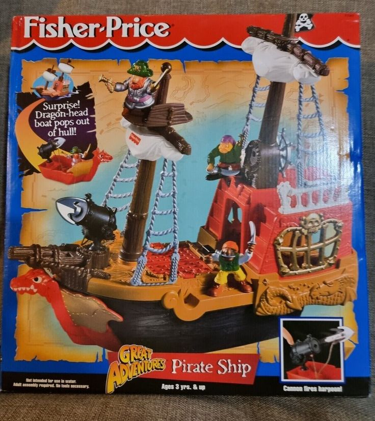 a toy pirate ship in its box with instructions on how to build it and play