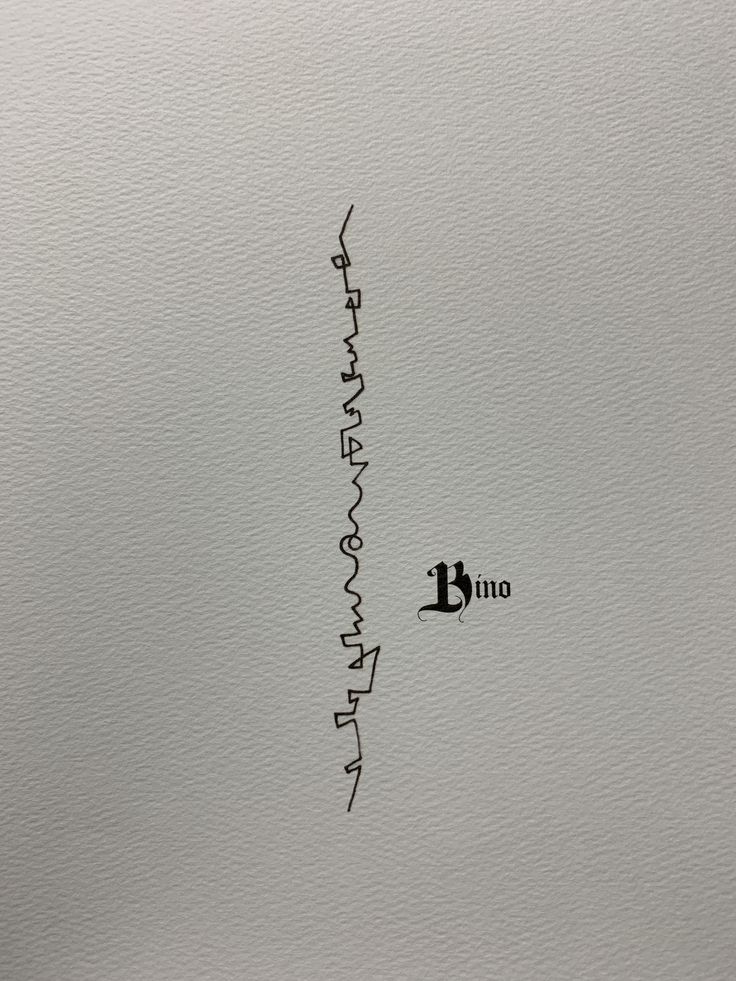 the word b is written in cursive writing