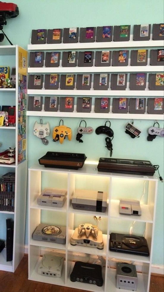 Crazy GameCube Video Games Collection Retro Gaming Display, Video Games Room Ideas, Old Game System Display, Game Console Storage Ideas, Game Room Display Shelves, Gaming Room Organization, Gaming Collection Display, Retro Video Game Display, Game Console Display Ideas