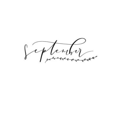 the word september written in cursive ink