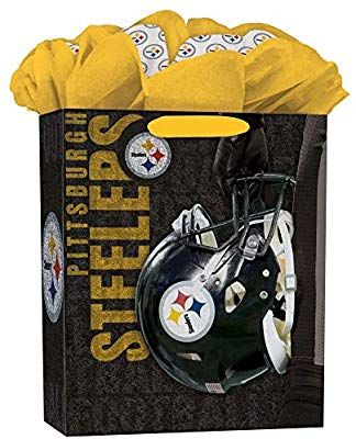 a black and yellow bag with a football helmet on the front is filled with balls