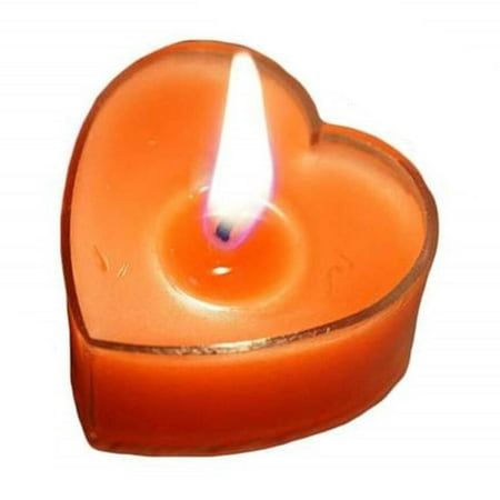 an orange heart shaped candle with a white flame