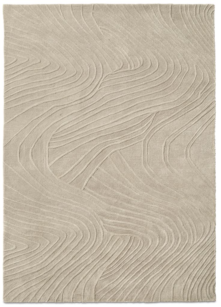 a beige rug with wavy lines on it