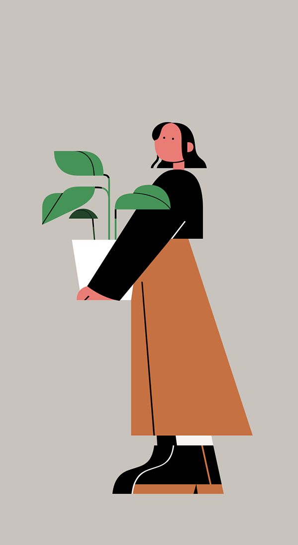 a woman holding a potted plant in her hand