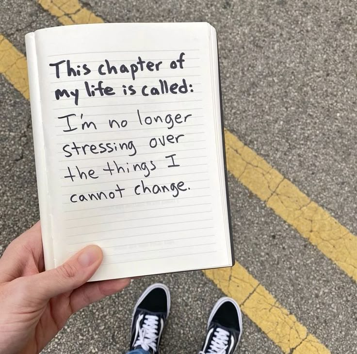 someone holding up a note that says, this character of my life is called i'm no longer stressing over the things i cannott change