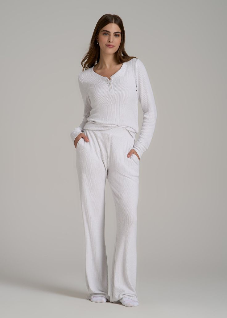 About Our Ribbed Flare Extra-Long Lounge Pants Say hello to the loungewear, made just for you. Our Ribbed Flare Extra-Long Lounge Pants are the cozy pair you’ll want to wear everywhere. Made with a soft ribbed knit, the casual pants are perfect for weekends away or peaceful staycations. We designed these women’s tall lounge pants just for ladies from 5’9 to 6’6, so you can trust us when we say they’re full length. We’ve also ensured the tri-blend fabric has been pre-washed and shrinkage controll White Pajamas Women, Full Length Bottoms With Soft Texture For Loungewear, Soft Texture Full Length Loungewear Bottoms, Stretch Sweatpants For Loungewear, Ribbed Lounging Bottoms, White Full Length Sweatpants For Loungewear, Comfy Loungewear Bottoms With Soft Texture, White Straight Sweatpants For Lounging, Cozy Bottoms For Relaxation