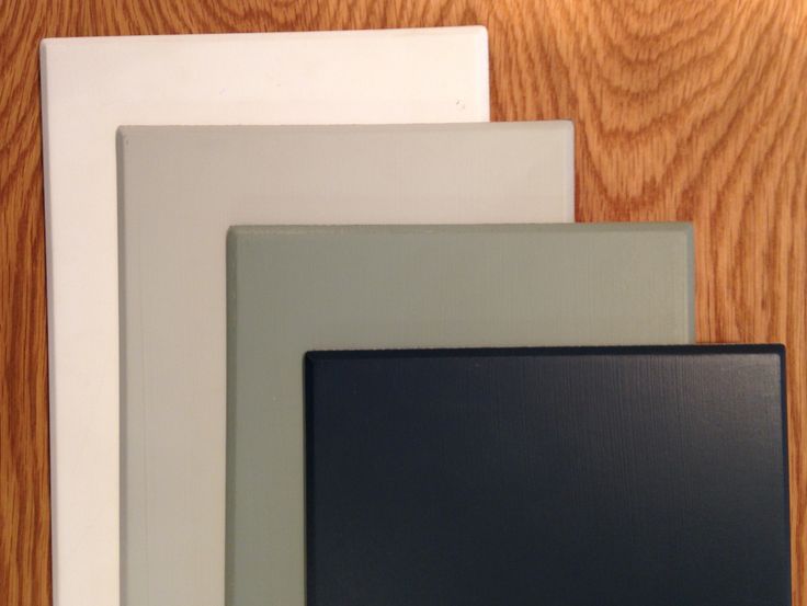 four different types of frames on a wooden surface