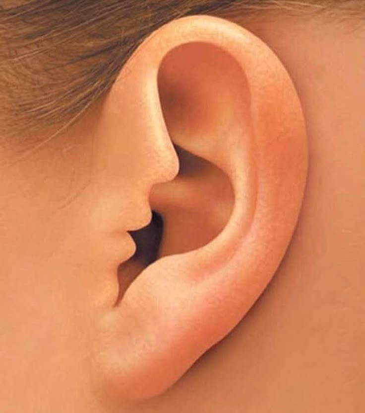 an ear is shown with arabic writing in the middle and on the bottom corner, there is