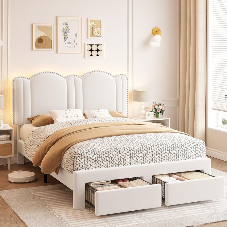 a white bed with two drawers under the headboard and side tables on either side