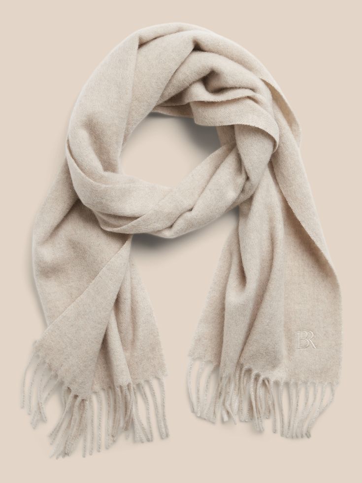 Spun from pure cashmere, this soft and warm scarf will be the one you reach for on cold days for seasons to come.  Length: 63" (160cm) Width: 12" (30. 5cm) Classic Beige Scarf For Fall, Classic Beige Scarves For Fall, Classic Cashmere Scarves, Classic Cashmere Shawl For Winter, Classic Winter Cashmere Shawl, Classic Beige Shawl For Winter, Classic Wool Scarves For Cold Weather, Classic Beige Shawl For Fall, Classic Cashmere Scarves For Fall