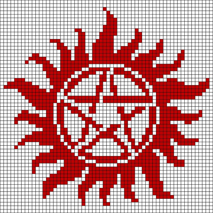 a cross stitch pattern with red and white designs