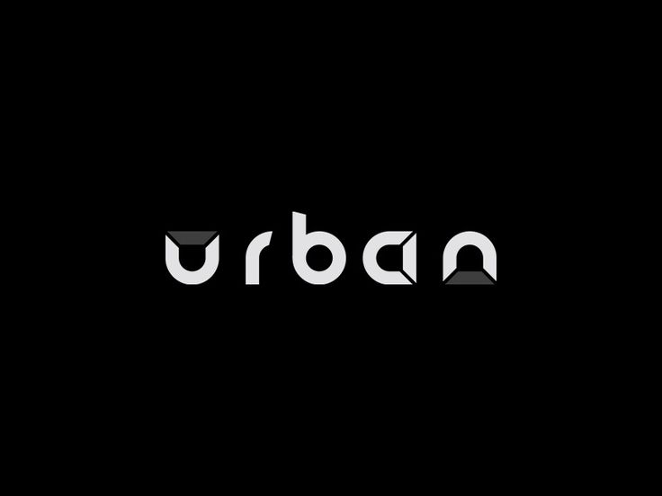 the word urban written in black and white on a dark background with an arrow pointing to it