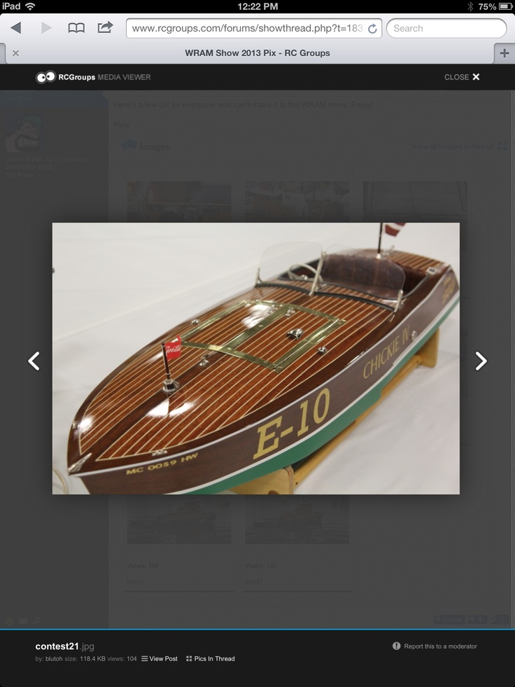 an image of a wooden boat being displayed on the webpage for people to see