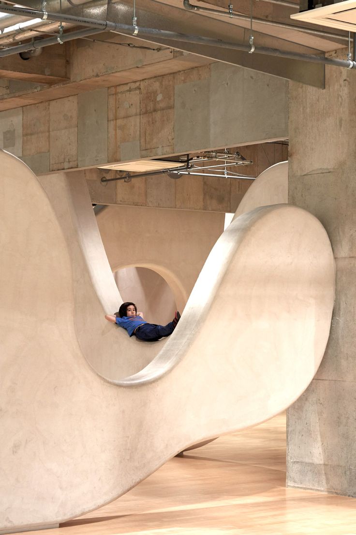 a skateboarder is riding on the inside of a half pipe