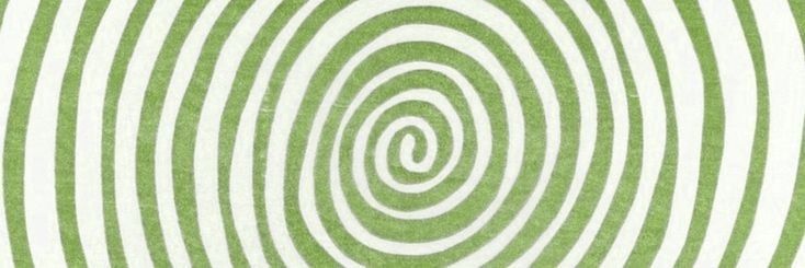 an abstract green and white background with spirals in the center, as if it were made from paper