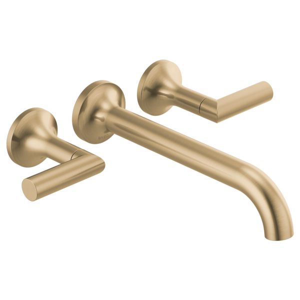 an image of two handles on a wall mounted faucet in brushed brass finish