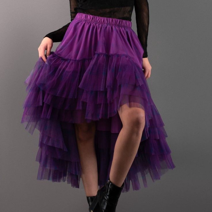 Make A Bold Fashion Statement With This Plaid High-Low Ruffle Tulle Skirt. This Eye-Catching Skirt Combines A Classic Plaid Pattern With A Modern High-Low Hemline, Layered With Delicate Tulle Ruffles For A Perfect Blend Of Edgy And Feminine Style. The Asymmetrical Design Adds A Dynamic Touch, Making It Ideal For Those Who Love To Stand Out From The Crowd. Perfect For Pairing With A Simple Top Or Leather Jacket, This Skirt Is Versatile Enough For Both Casual Outings And Dressier Occasions. With I Fitted Purple Skirt With Ruffles, Purple Long Skirt With Ruffles, Purple Tiered Ruffled Skirt, Fitted Purple Petticoat, Long Ruffled Skirt In Purple, Purple Long Ruffled Skirt, Fitted Purple Tulle Skirt, Purple Tulle Flowy Skirt, Ruffle Tulle Skirt