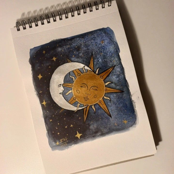 a drawing of a sun and moon with stars on it