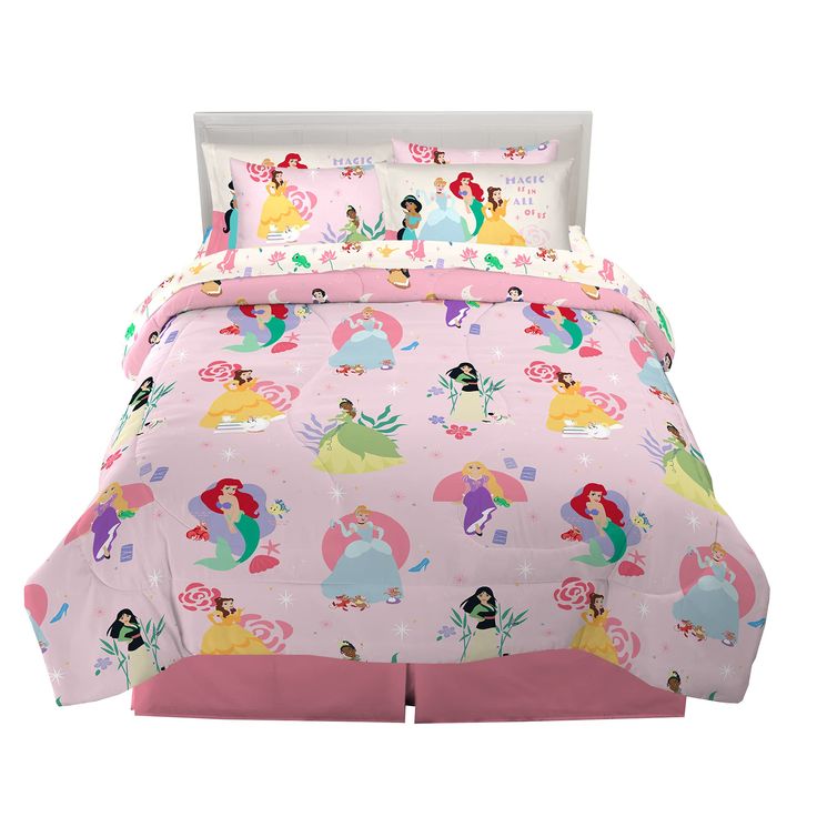 a pink bed with princesses on it