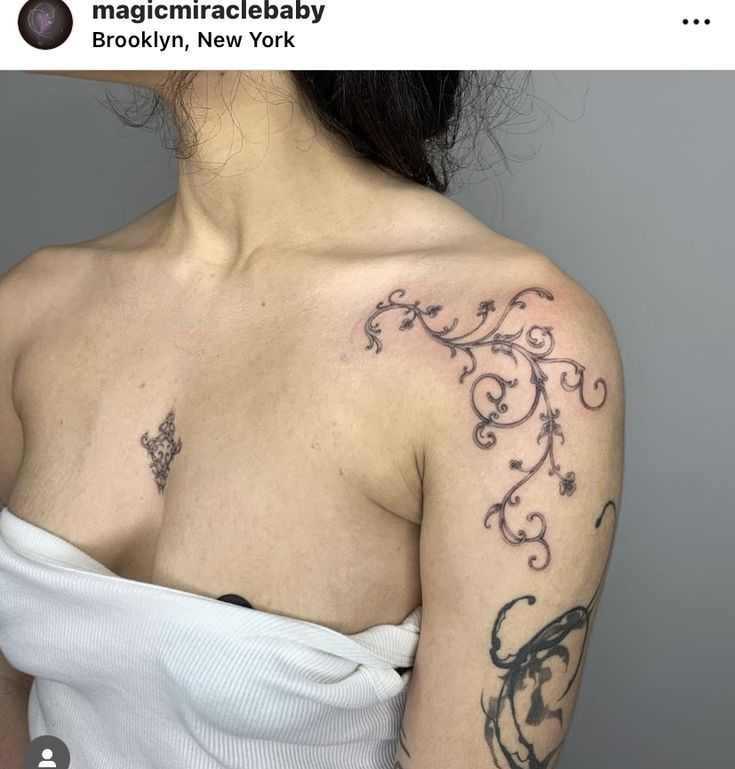 a woman with a tattoo on her shoulder