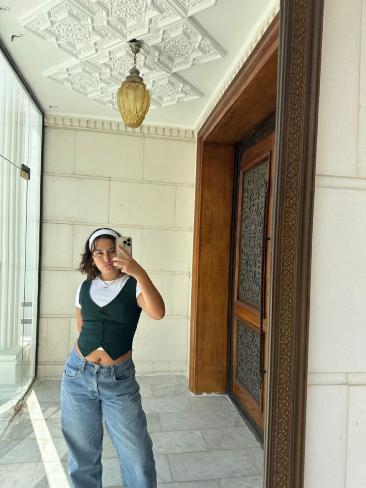 90s aesthetic womens outfit green vest white tee baggy 90s jeans Baggy Jeans 90s Outfit, Green Waistcoat Women Outfit, Baggy Jeans Outfit 90s Women, Waistcoat Women Outfit, 90s Vest Outfits, Baggy Jeans Outfit 90s, Green Vest Outfit, 90s Vest, Baggy Jeans Outfit