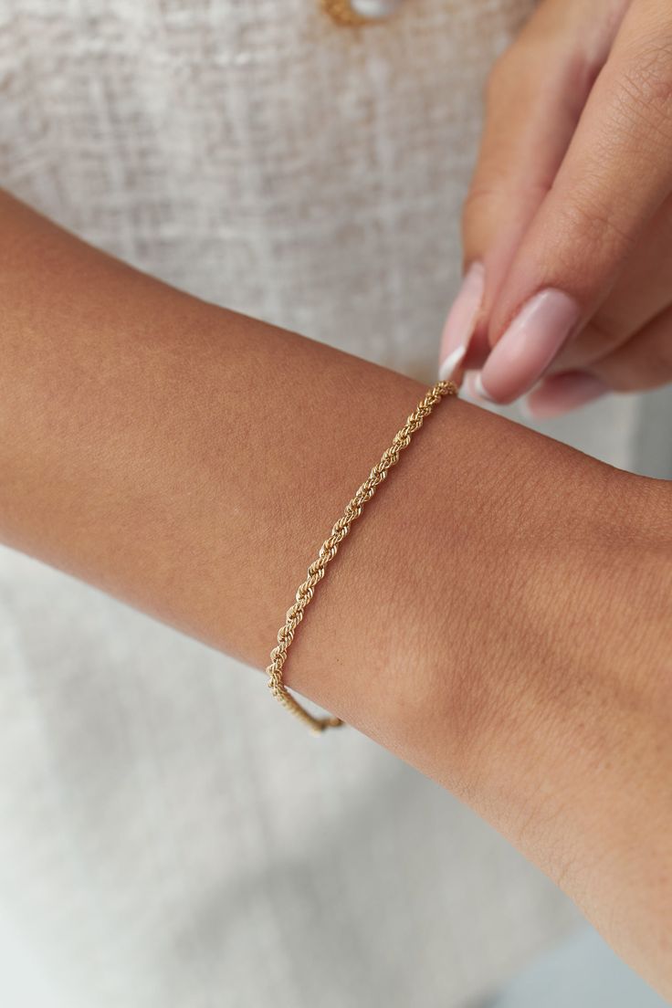 14k Real Gold Rope Chain Bracelet, 2.3 mm Rope Chain, Twisted Chain Bracelet, Men, Woman Stacking Bracelet, Diamond Cut Bracelet Material: Gold Karat: 14 K (585) Weight : 1,3 Gr Perfect piece for every day look that can be used alone.Bracelet Includes a lobster clasp to uphold strength and comfort. This bracelet is made with real 14k gold and is stamped with the appropriate 14k metal stamp 585. The perfect birthday or holiday (Valentines Day, Hanukah, Christmas, Mothers Day...etc.) gift! Feel Free to connect with us via social media PIN IT PINTEREST FOLLOW on INSTAGRAM - @fiemma  LIKE IT on FACEBOOK - @fiemmajewellery Want to Check Out More from Our Sections FİEMMA http://www.etsy.me/3ukWhje Gold Rings http://www.etsy.me/39E9NGS Gold Necklaces http://www.etsy.me/31NdjtO Gold Bracelets http Rope Chain Bracelet Gold, Classic Gold Rope Chain Bracelet As Gift, Classic Gold Rope Chain Bracelet For Gift, Classic Rope Chain Bracelets As Gift, Everyday Yellow Gold Rope Chain Bracelet, Rope Chain Link Bracelet Gift, Rope Chain Link Bracelet As Gift, Classic Rope Chain Bracelet, 14k Gold Rope Chain Bracelet As Gift