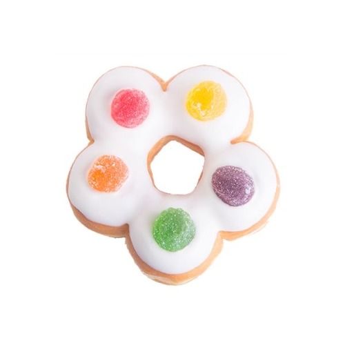 a doughnut shaped like a flower with four different colored candies