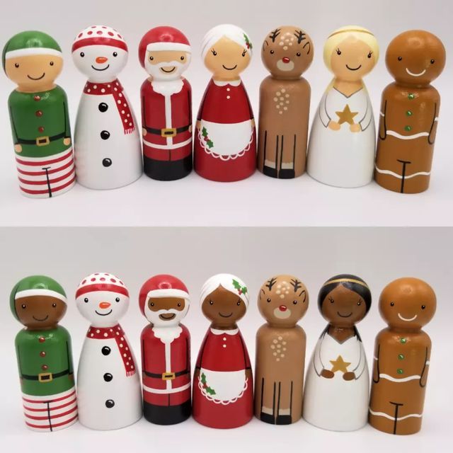 several wooden figurines in different colors and sizes