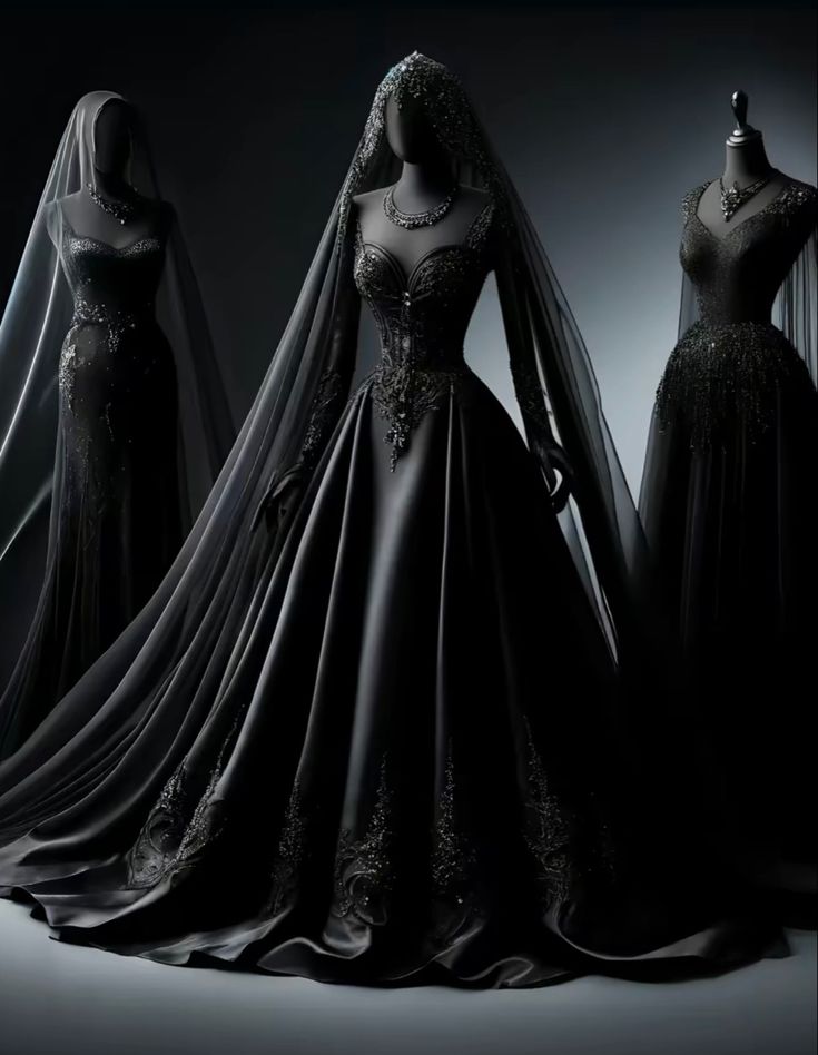 three mannequins dressed in black gowns and veils