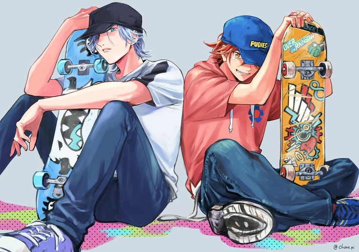 two young men sitting on the ground with skateboards in their hands and one holding his head