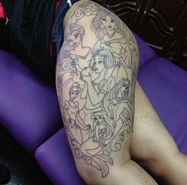 a woman with a tattoo on her leg