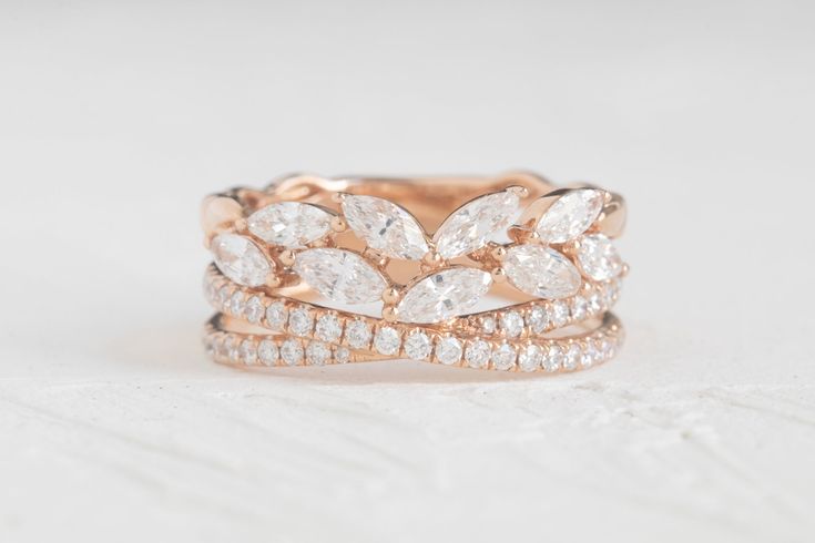 a close up of a ring with diamonds on it