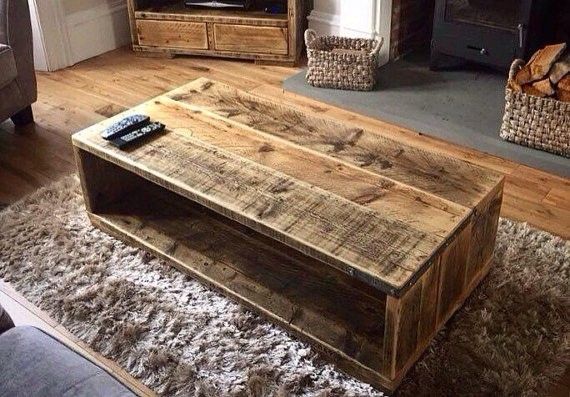 a living room with a large wooden coffee table