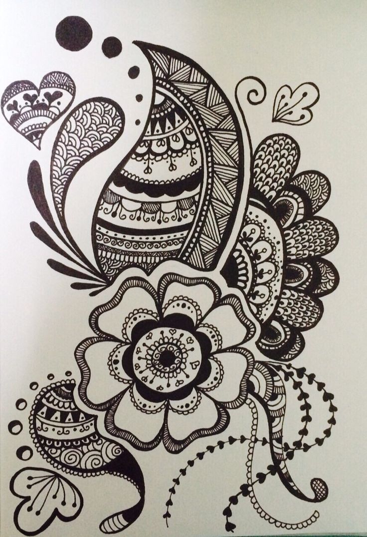 a drawing of a flower with lots of paisleys and hearts on it's side