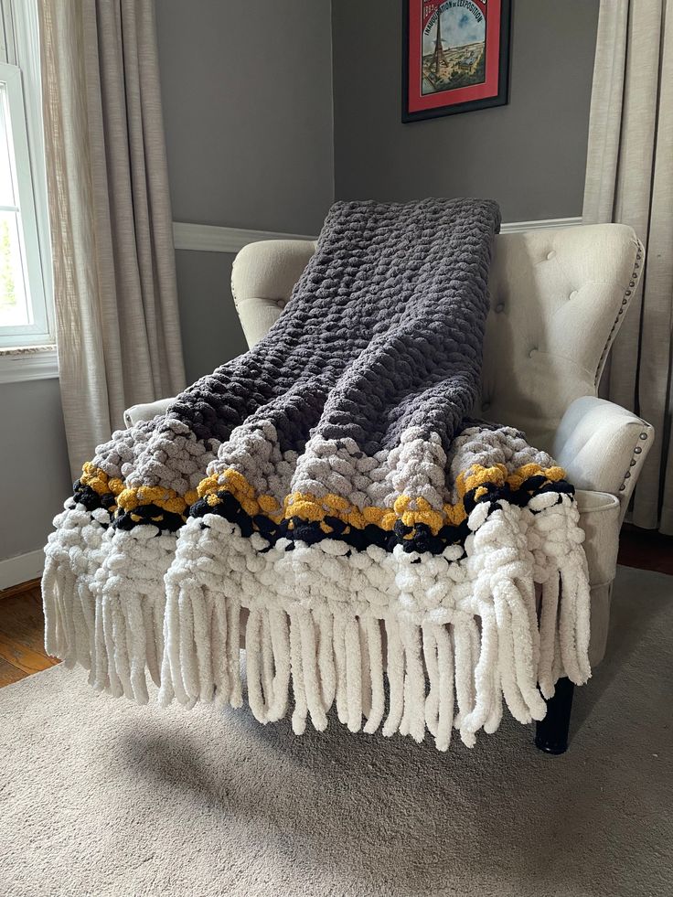 Chunky Knit Fringe Blanket | Gray and Yellow Knit Throw - Hands On For Homemade Gray Chunky Knit Blanket, Black And White Chunky Knit Blanket, Knit Blanket Color Schemes, Chunky Blanket Color Ideas, Chunky Finger Knit Blanket, Chunky Knit Blanket Ideas, Chunky Knit Blanket Pattern Color Combos, Green Chunky Knit Blanket, Big Yarn Blanket