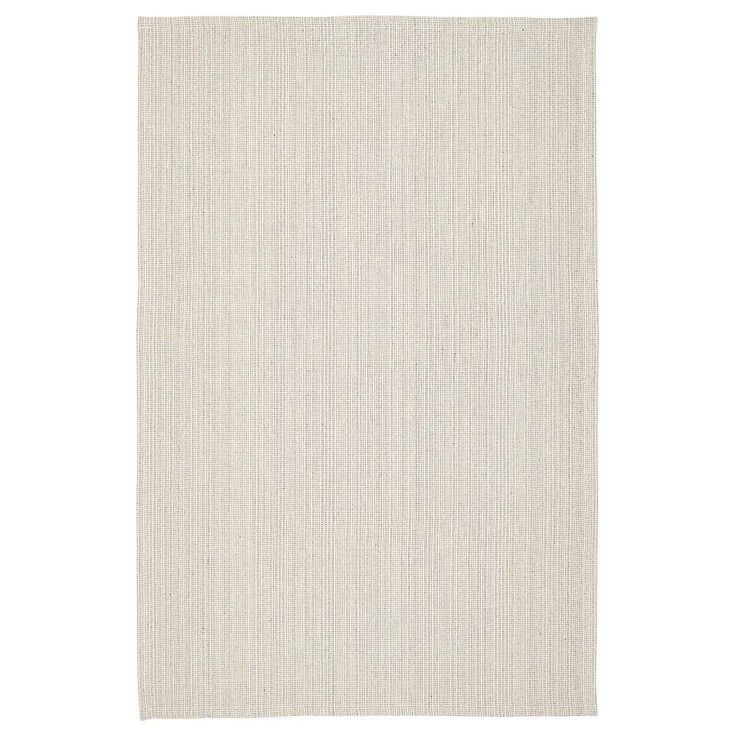 a white rug with vertical stripes on the bottom, and an off - white background