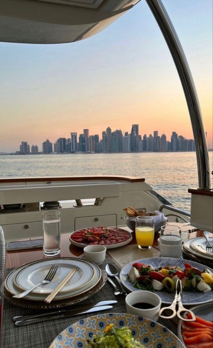 the table is set for two on the boat